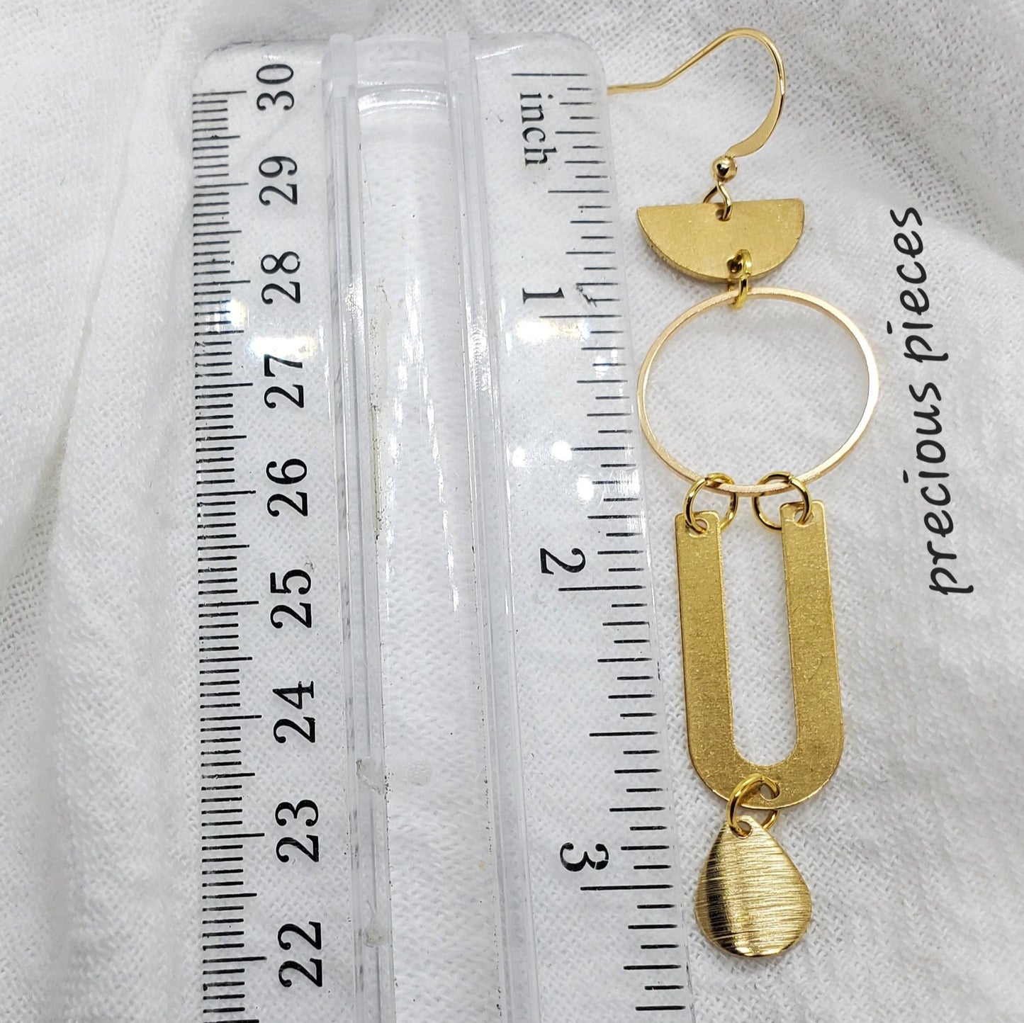 Four Piece Brass Earrings