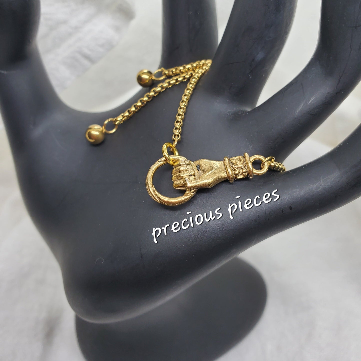 Grasping Hand Charm Slider Bracelets