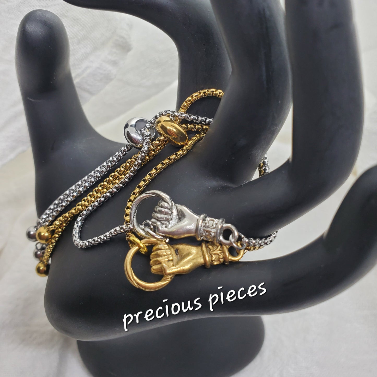 Grasping Hand Charm Slider Bracelets