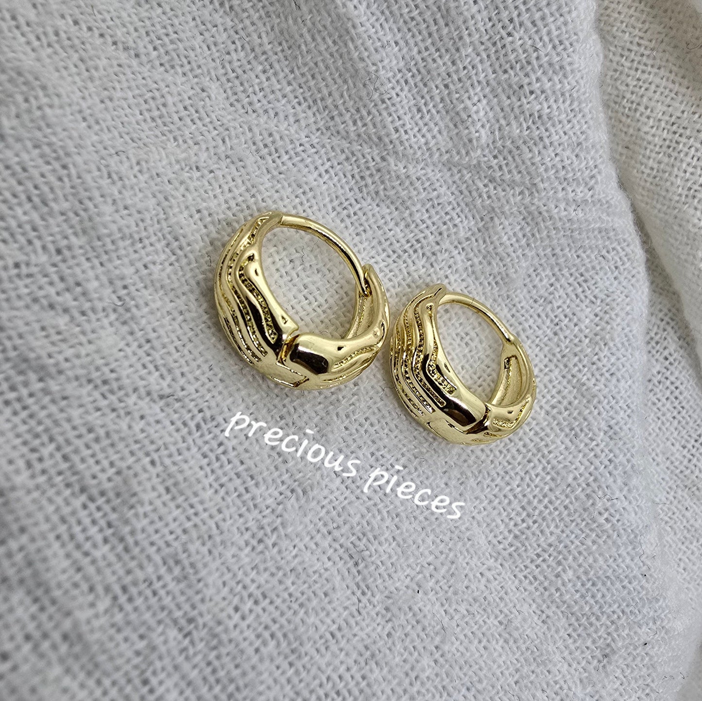 Mini Oval Huggie Earrings