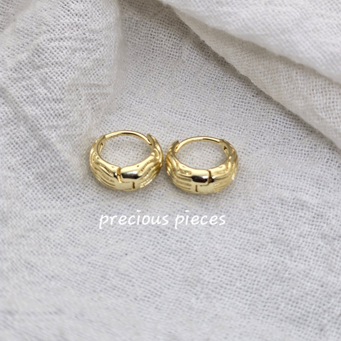 Mini Oval Huggie Earrings