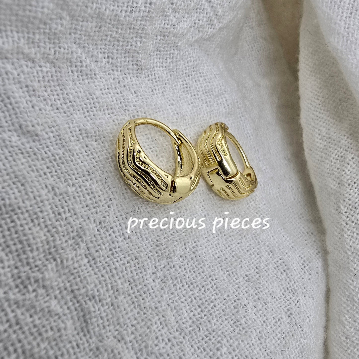 Mini Oval Huggie Earrings